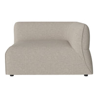 Beige curved sofa with a textured fabric pattern, ideal for modern living spaces.