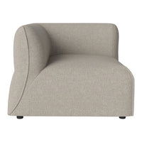 Light beige curved accent chair with a smooth texture and subtle fabric pattern, ideal for modern decor.
