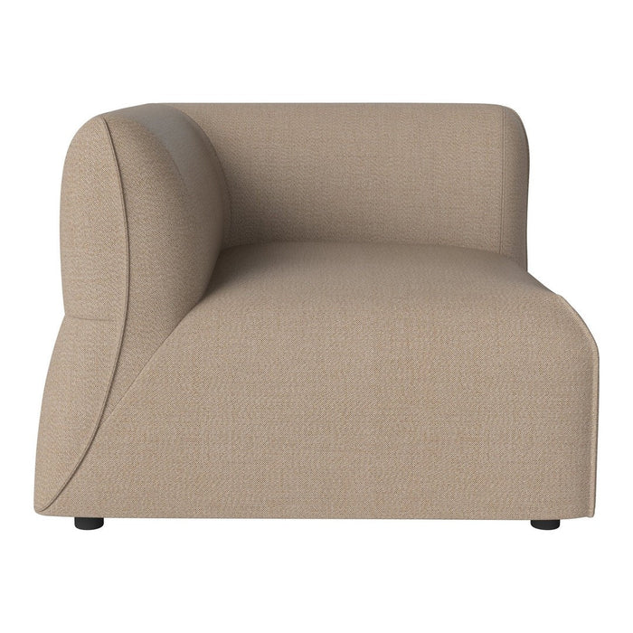 Beige upholstered sofa with a smooth, textured finish and curved silhouette. Ideal for modern decor.
