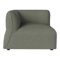 Gray upholstered modular sofa with a smooth texture and curved design, perfect for modern interiors.