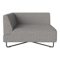 Gray upholstered corner sofa with a minimalist design and subtle textured fabric on a sleek metal frame.
