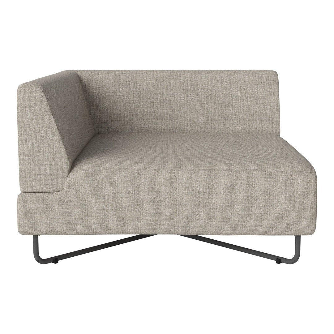 Light beige modular sofa with a sleek design and subtle textured fabric, featuring a modern black metal base.