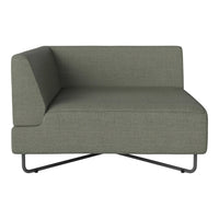 Grey textured sectional couch with minimalist design and a sleek metal base. Perfect for modern living spaces.