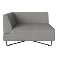 Gray upholstered sofa with a smooth texture, featuring a minimalist design and sleek metal legs. Ideal for modern decor.
