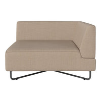 Beige upholstered sectional sofa with a modern design and minimalist pattern, featuring sleek metallic legs.