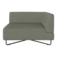 Modern green upholstered sofa with a sleek, minimalist design and a textured finish. Perfect for contemporary decor.