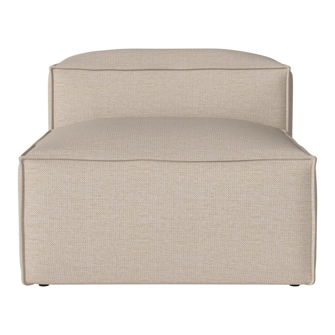 Beige upholstered lounge chair with a smooth, textured finish and minimalist design. Perfect for modern decor.