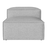 Light gray upholstered chair with a smooth, modern texture and minimalist design. Perfect for contemporary decor.