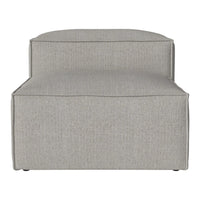 Gray upholstered accent chair with subtle texture and clean lines, perfect for modern decor.