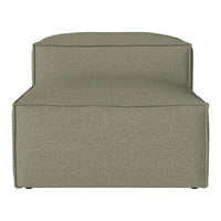 Cozy ottoman in a soft olive green hue with a textured fabric pattern, perfect for modern home decor.