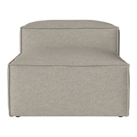 Light beige fabric ottoman with a smooth, minimalist design and subtle texture. Perfect for modern décor.