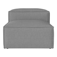 Gray upholstered ottoman with a sleek, modern design and minimalist pattern. Ideal for versatile decor.
