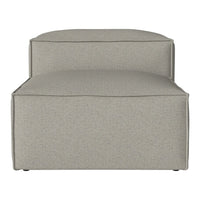 Light gray upholstered ottoman with a smooth, textured pattern, perfect for modern home décor.