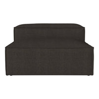 Dark gray upholstered sectional sofa with a sleek, minimalist design and subtle texture. Perfect for modern decor.