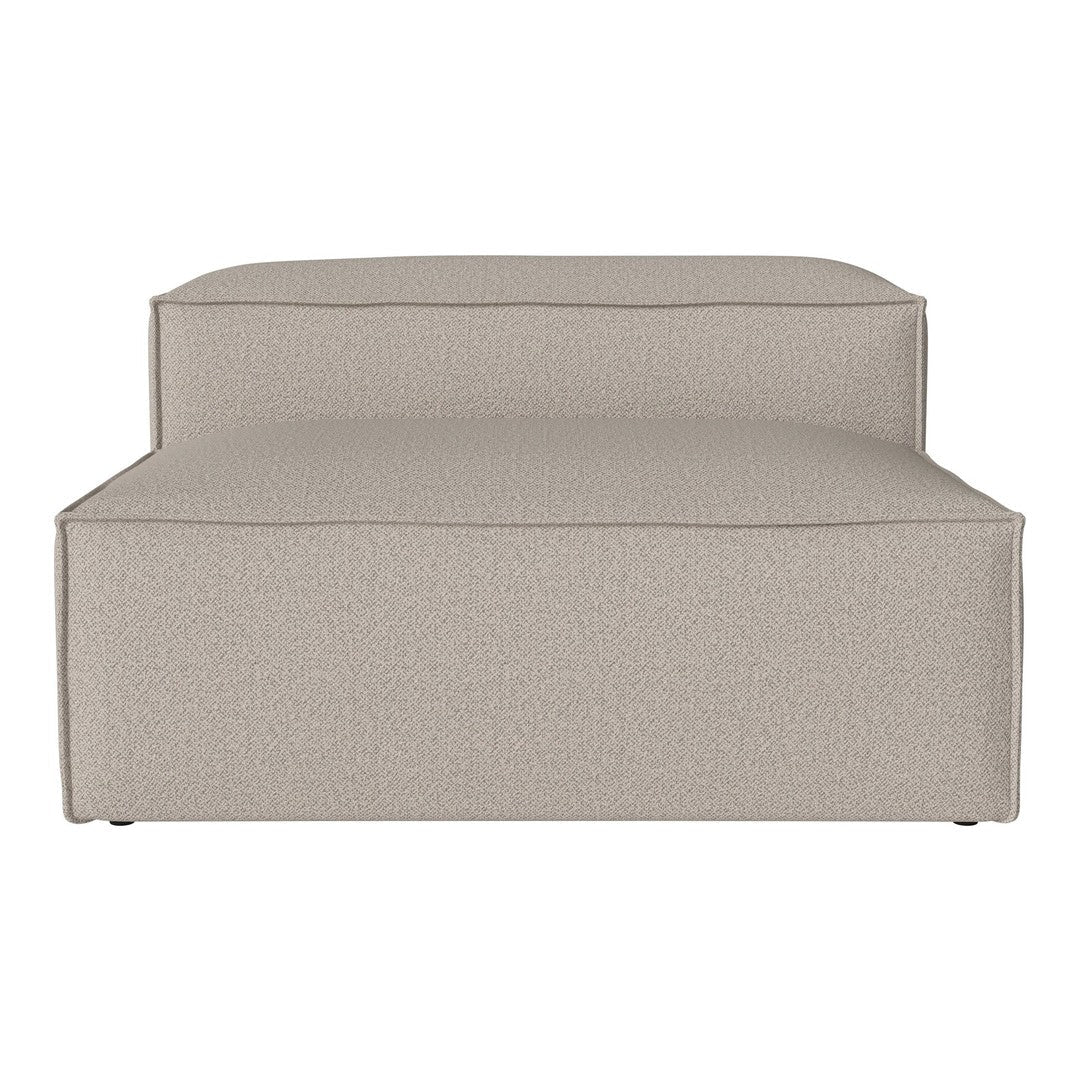 Beige textured lounge chair with a minimalist design and clean lines. Perfect for modern decor.