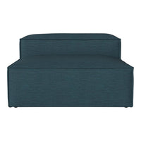 Teal upholstered lounge chair with a smooth, solid pattern and modern design, perfect for contemporary spaces.