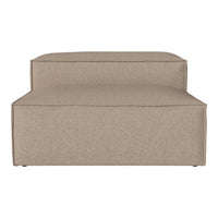 Beige upholstered sofa with a minimalist design and clean lines, perfect for modern interiors.