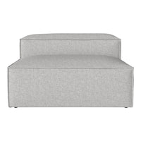 Stylish light gray upholstered sofa with clean lines and minimalist design. Perfect for modern decor.