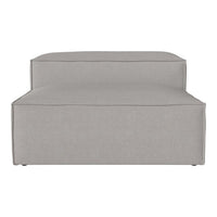 Light gray modular sofa with a smooth, minimalist design and clean lines, ideal for modern living spaces.