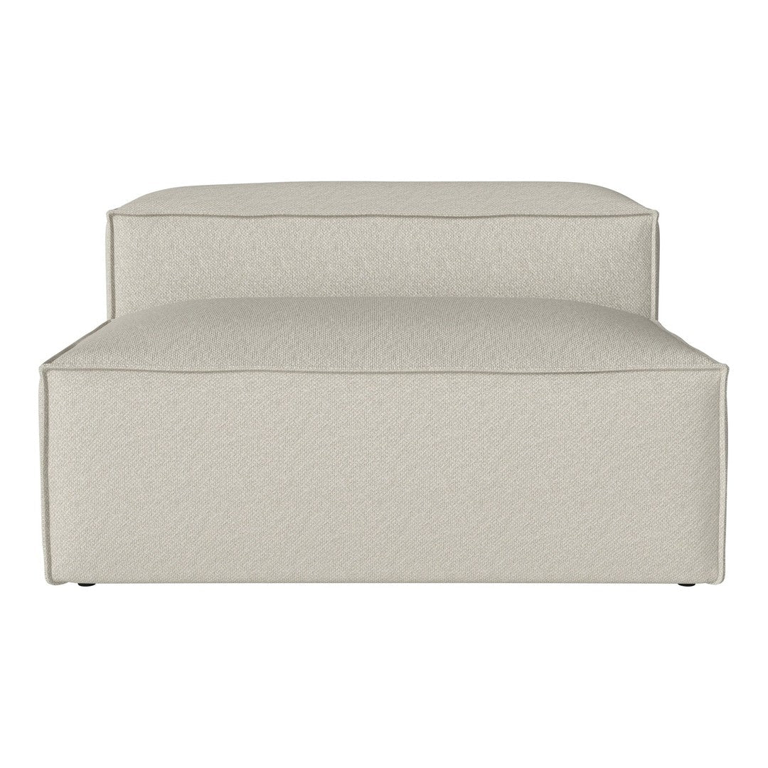 Light beige ottoman with a textured pattern, featuring a modern, minimalist design. Perfect for any home decor.