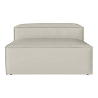 Light beige ottoman with a textured pattern, featuring a modern, minimalist design. Perfect for any home decor.