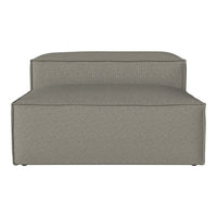 Gray textured lounge chair with a modern design, featuring subtle patterns for a contemporary look.