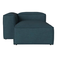 Teal upholstered modular chair with a smooth, textured fabric surface and clean, modern lines. Perfect for contemporary decor.