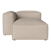 Beige textured fabric sectional couch with clean lines and modern design. Perfect for versatile home decor.