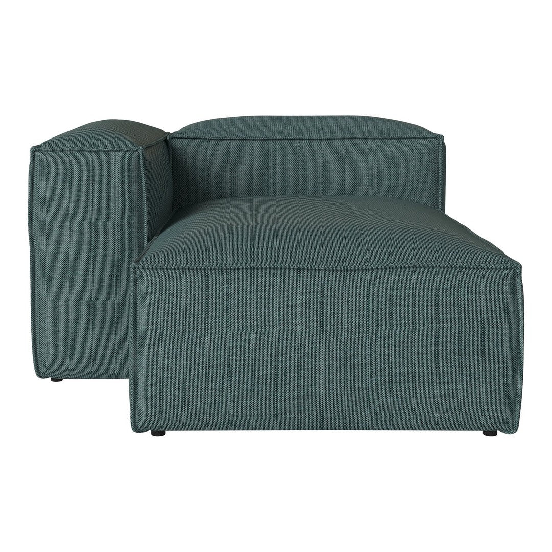 Teal textured lounge chair with a modern, minimalist design, featuring clean lines and a boxy silhouette.