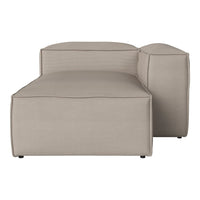 Beige modular sofa with soft, smooth texture and clean lines, perfect for modern living spaces.