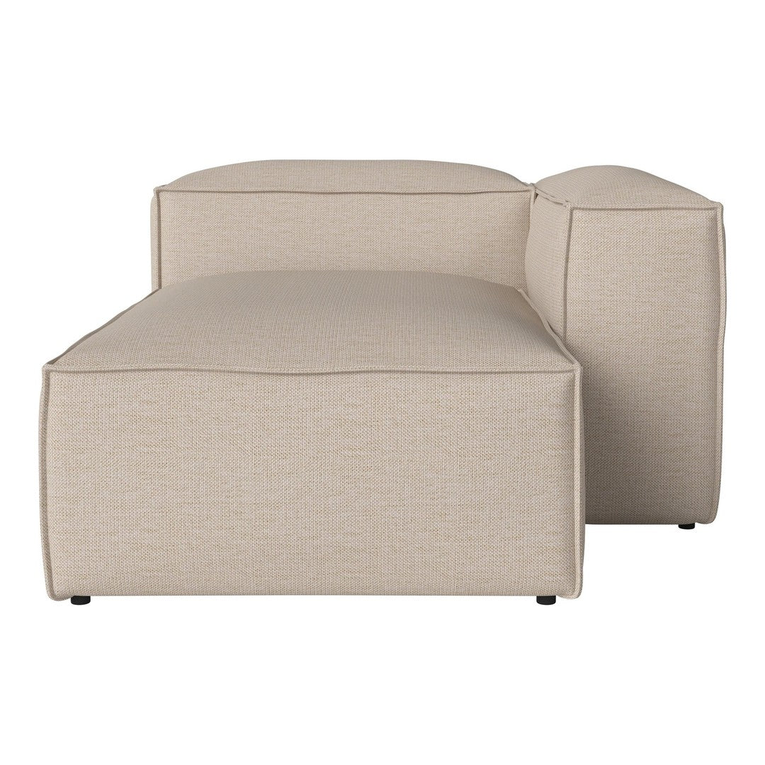 Beige textured fabric chaise lounge with modern, minimalist design and soft, curved edges. Ideal for cozy spaces.