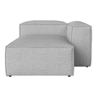 Light gray modular couch with a smooth, textured fabric and minimalistic design. Perfect for modern living spaces.