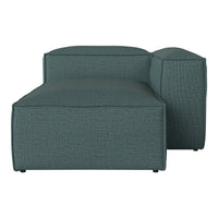 Teal textured lounge sofa with a minimalist design and clean lines for modern decor.