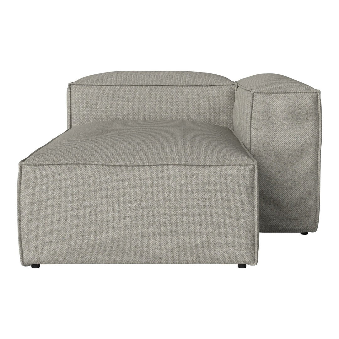 Light gray fabric chaise lounge with simple, modern boxy shape and subtle textured pattern. Perfect for contemporary decor.