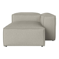 Light gray modular sofa with a smooth, textured fabric and minimalist design, perfect for modern interiors.