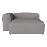 Gray modular sofa with a smooth, textured fabric for a modern look. Ideal for contemporary living spaces.
