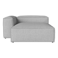 Light grey modern sectional sofa with a minimalist design and textured fabric pattern. Ideal for contemporary spaces.