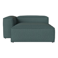 Teal textured outdoor lounge chair with clean lines and modern design, perfect for stylish patio decor.