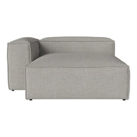Gray upholstered sectional lounge chair with a smooth, minimalist design and no visible patterns.