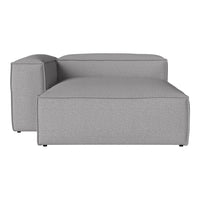 Gray sectional sofa with a smooth, textured fabric and minimalist design. Perfect for modern living spaces.