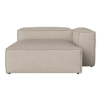 Light beige sectional sofa with a smooth, minimalist design and textured fabric. Perfect for modern living spaces.