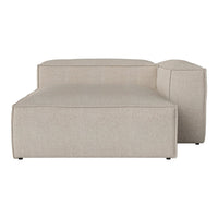 Beige upholstered sectional sofa with a smooth, modern design and subtle texture. Ideal for contemporary spaces.