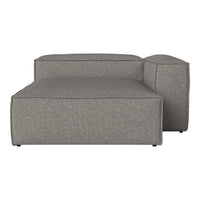 Modern gray sectional sofa with a minimalist design and textured fabric. Clean lines, perfect for contemporary spaces.