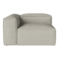 Light gray sectional sofa with smooth and textured patterns, modern minimalist design. Perfect for contemporary spaces.