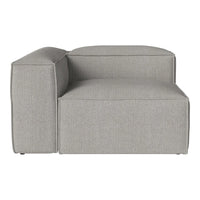Light grey sectional sofa with a sleek, modern design and subtle texture, perfect for minimalist decor.