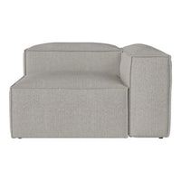 Light gray sectional sofa with a clean, textured fabric for a modern and minimalist aesthetic.