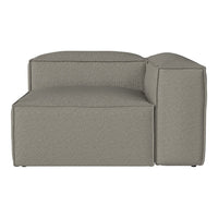 Gray textured upholstery on a modern sectional sofa, featuring a clean geometric design and soft surface.
