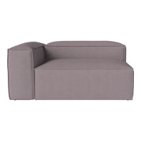 Gray modular sofa with a sleek, minimalist design and soft, smooth fabric texture. Perfect for modern interiors.