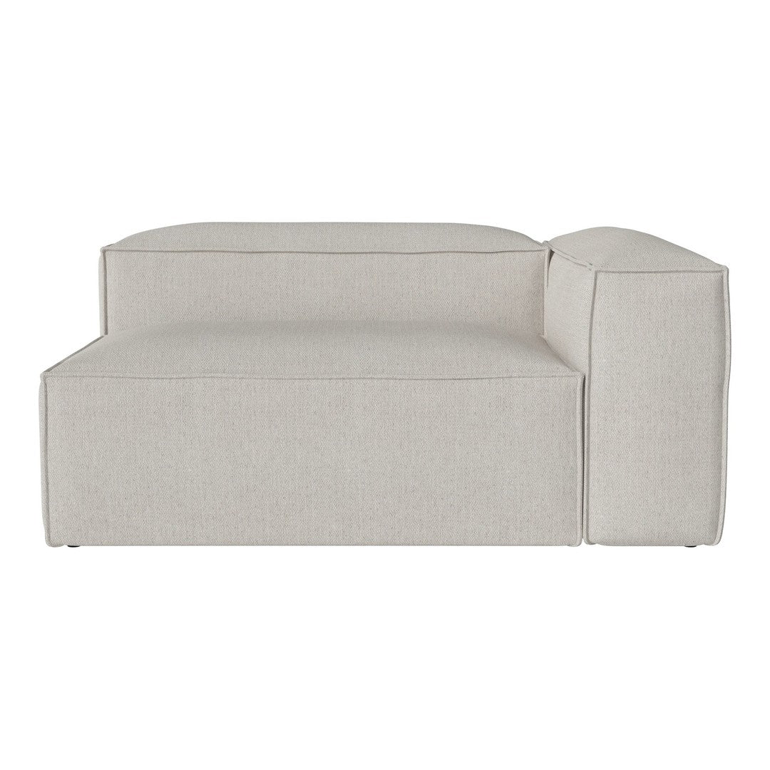 Light beige modular sectional sofa with a smooth, solid texture and modern, minimalistic design.