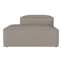 Beige modern chaise lounge with minimalistic design and smooth upholstery. Ideal for contemporary interiors.